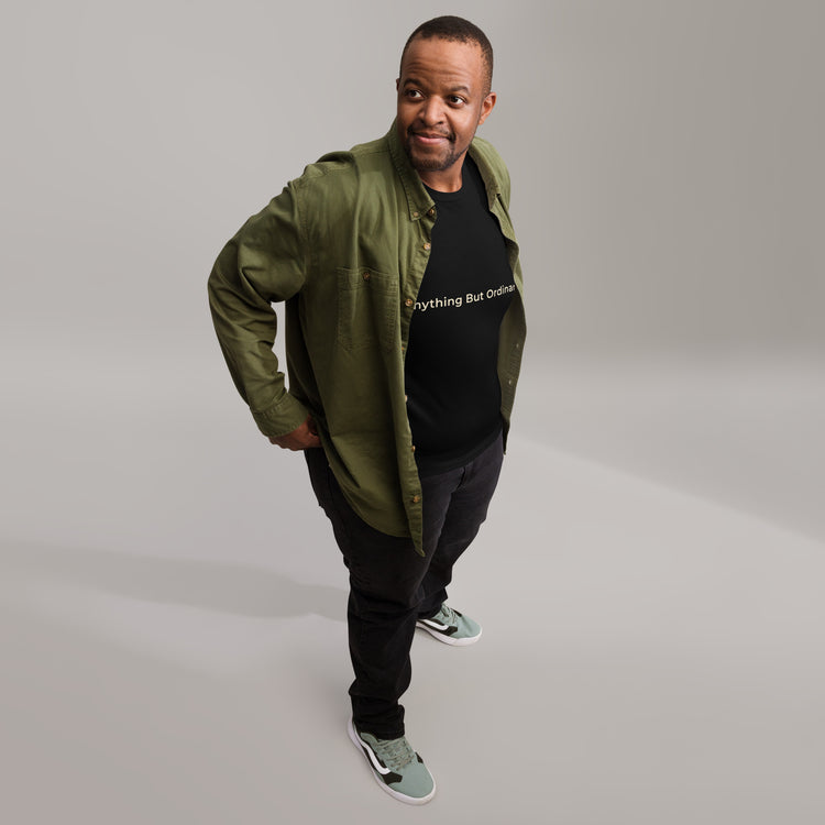 Black unisex t-shirt with the words, Anything But Ordinary on the front